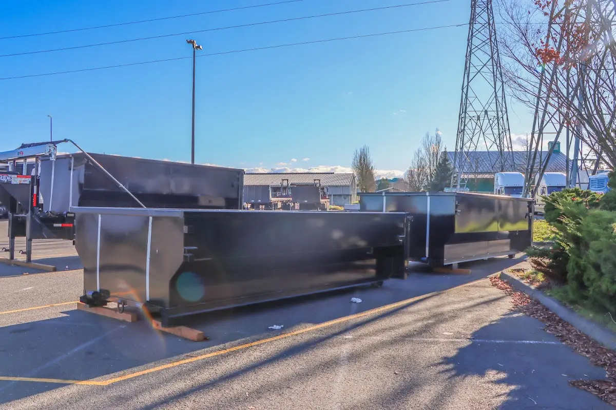 Roll-off dumpster ready for waste disposal at job site for Construction Dumpster Rental in Druid Hills